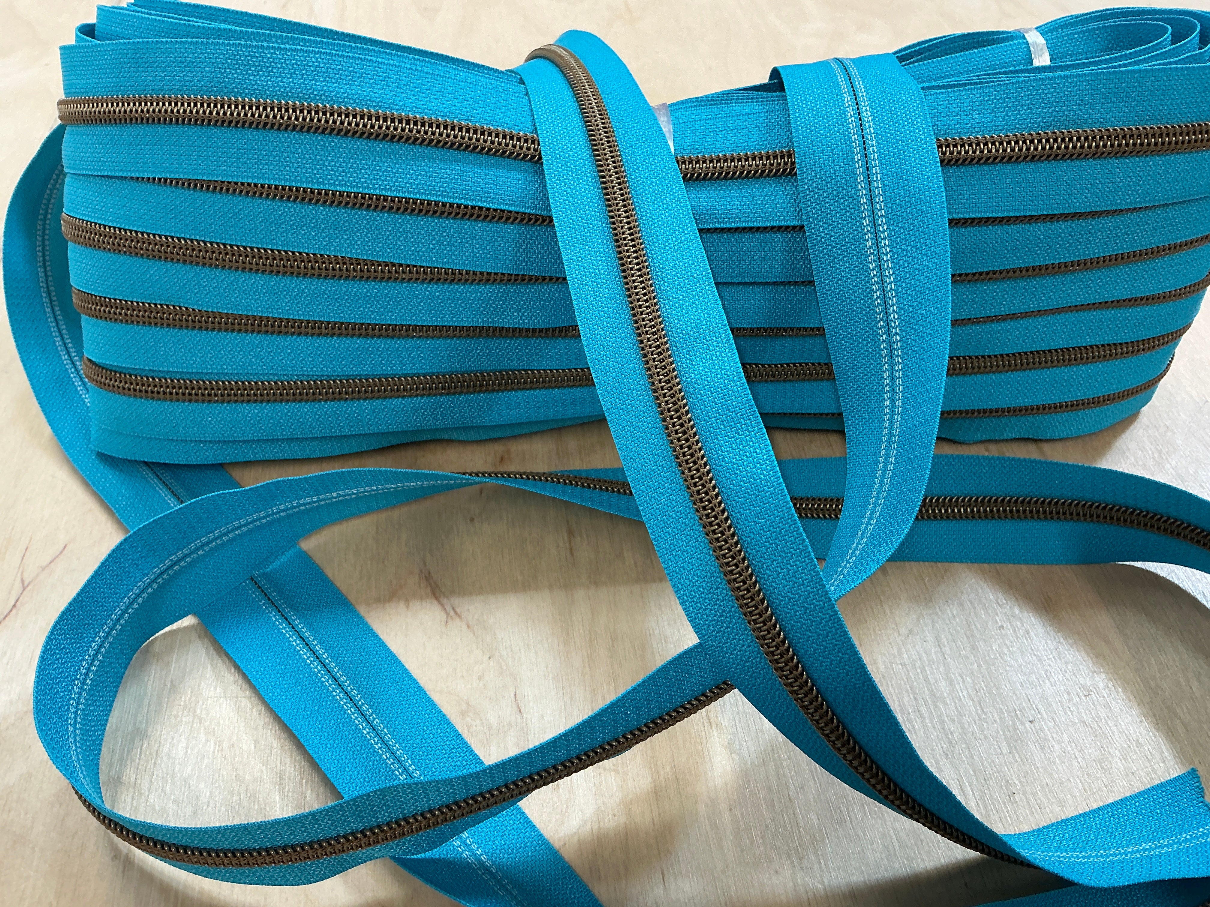 Turquoise with Antique Brass Teeth Continuous Zipper Tape