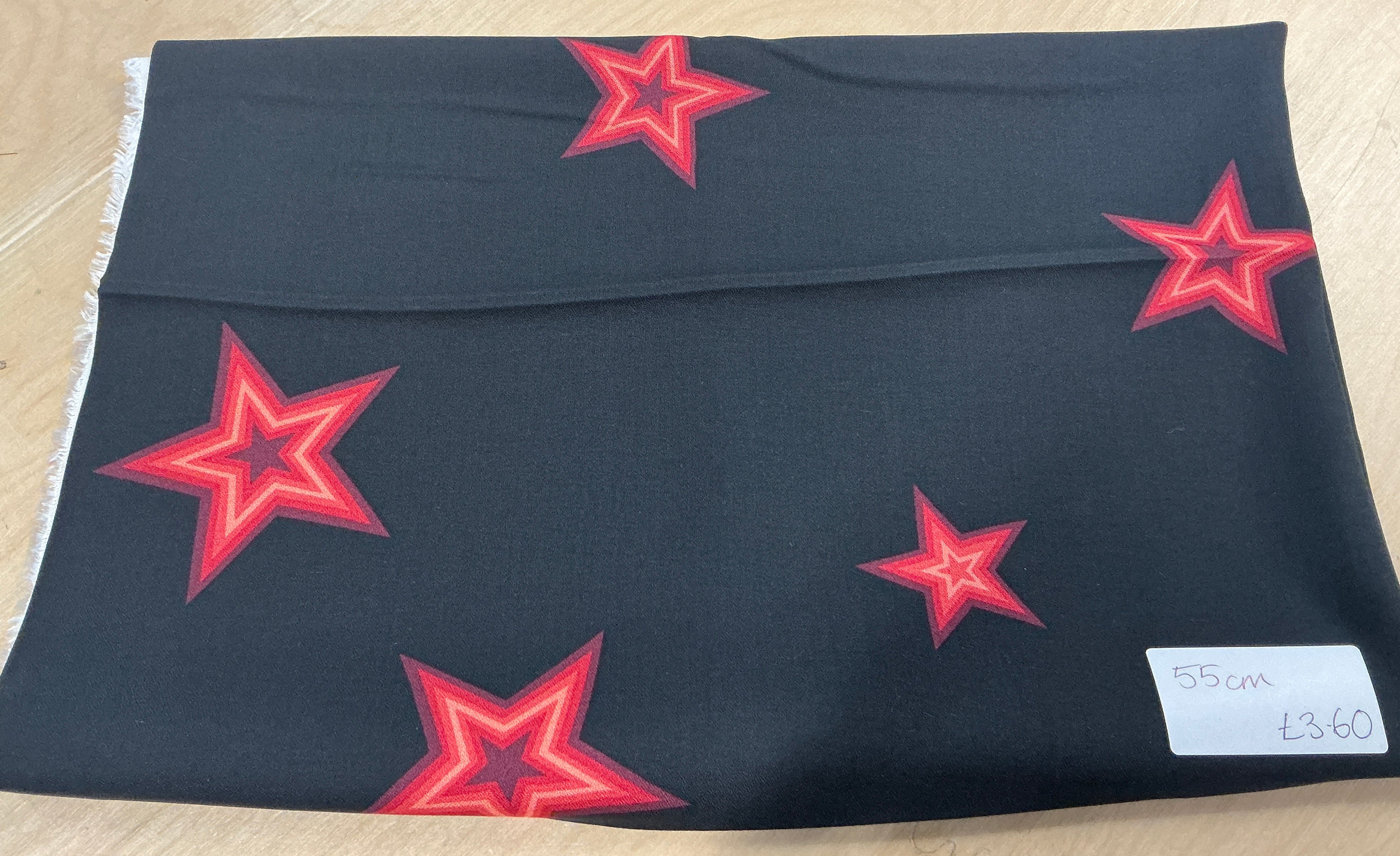 REMNANT  - 55cm red stars on black viscose