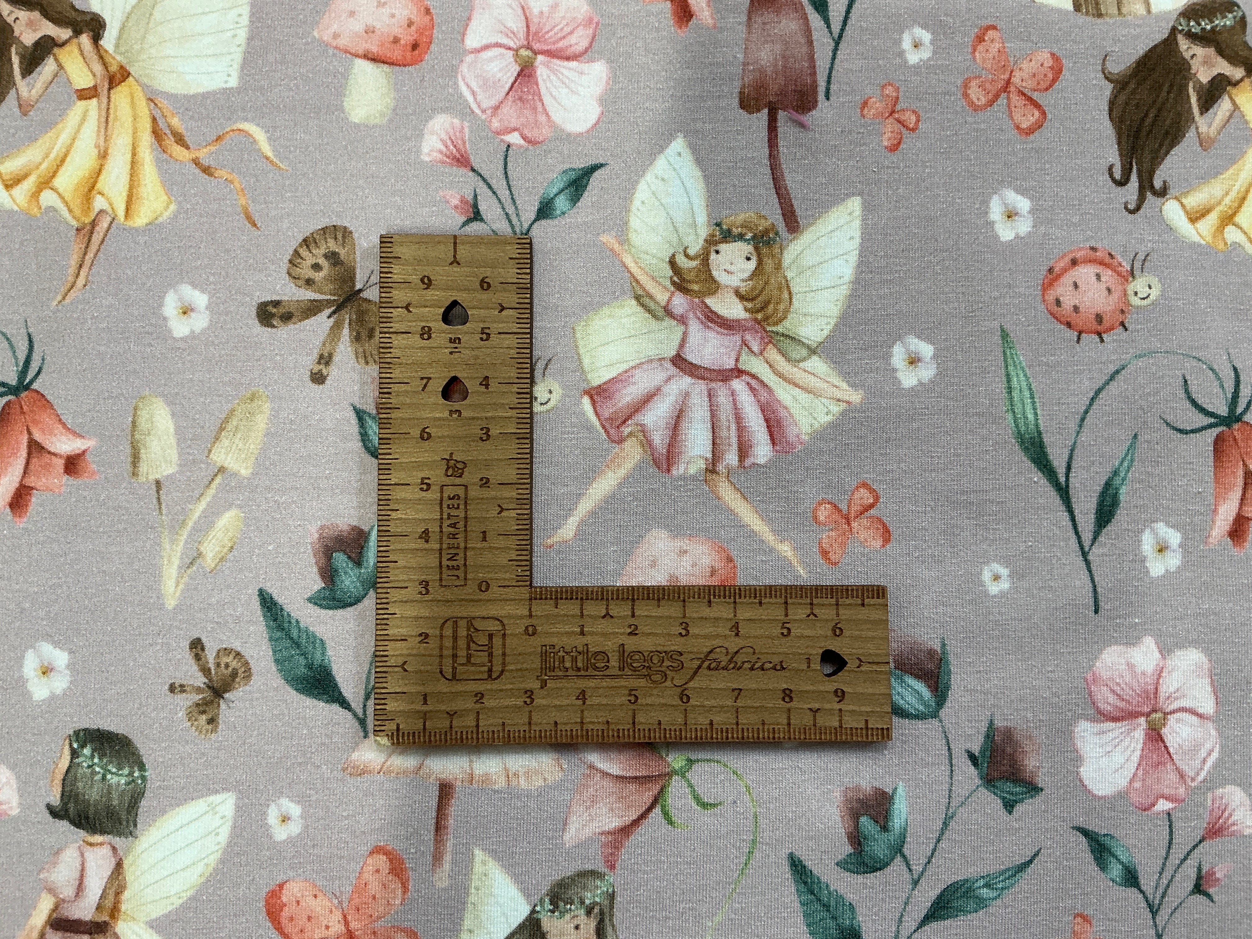 Flower Fairies on Dusty Pink Cotton Jersey Fabric