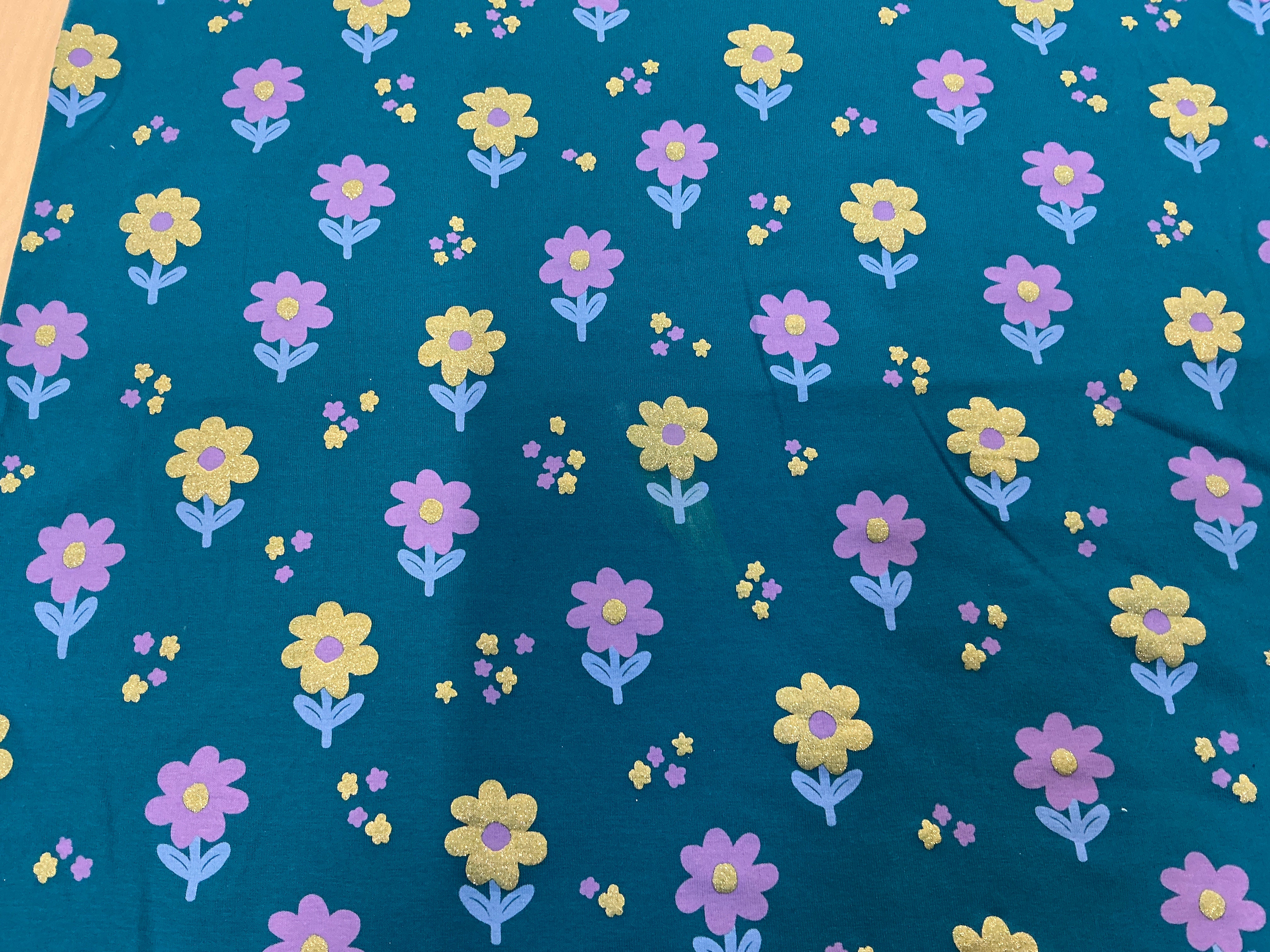 REMNANT  - (FLAWED) L1M x W140cm Glitter Flowers on Teal Jersey