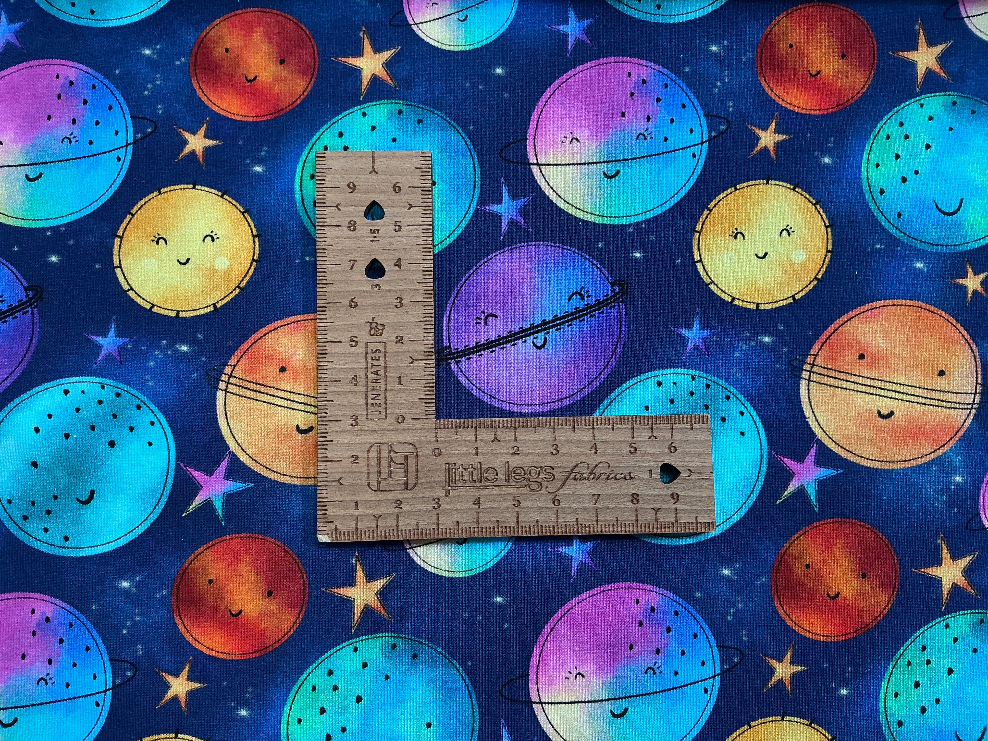 Happy Rainbow Planets Cotton Jersey Fabric