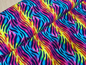 Zebra Stripes on Rainbow Tie Dye Jersey Fabric