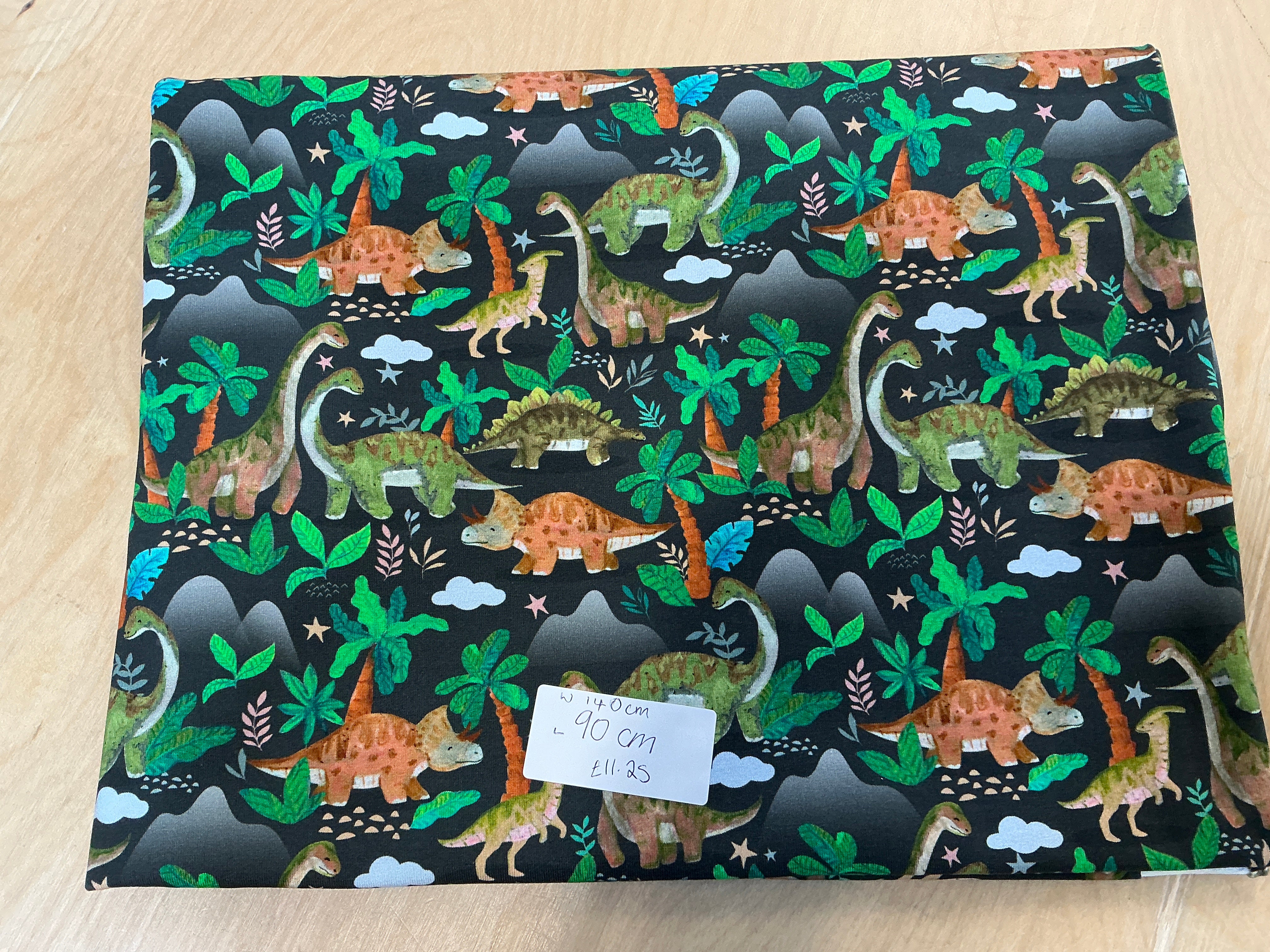 REMNANT  - L90cm x W140cm Dinosaur March on Charcoal Jersey