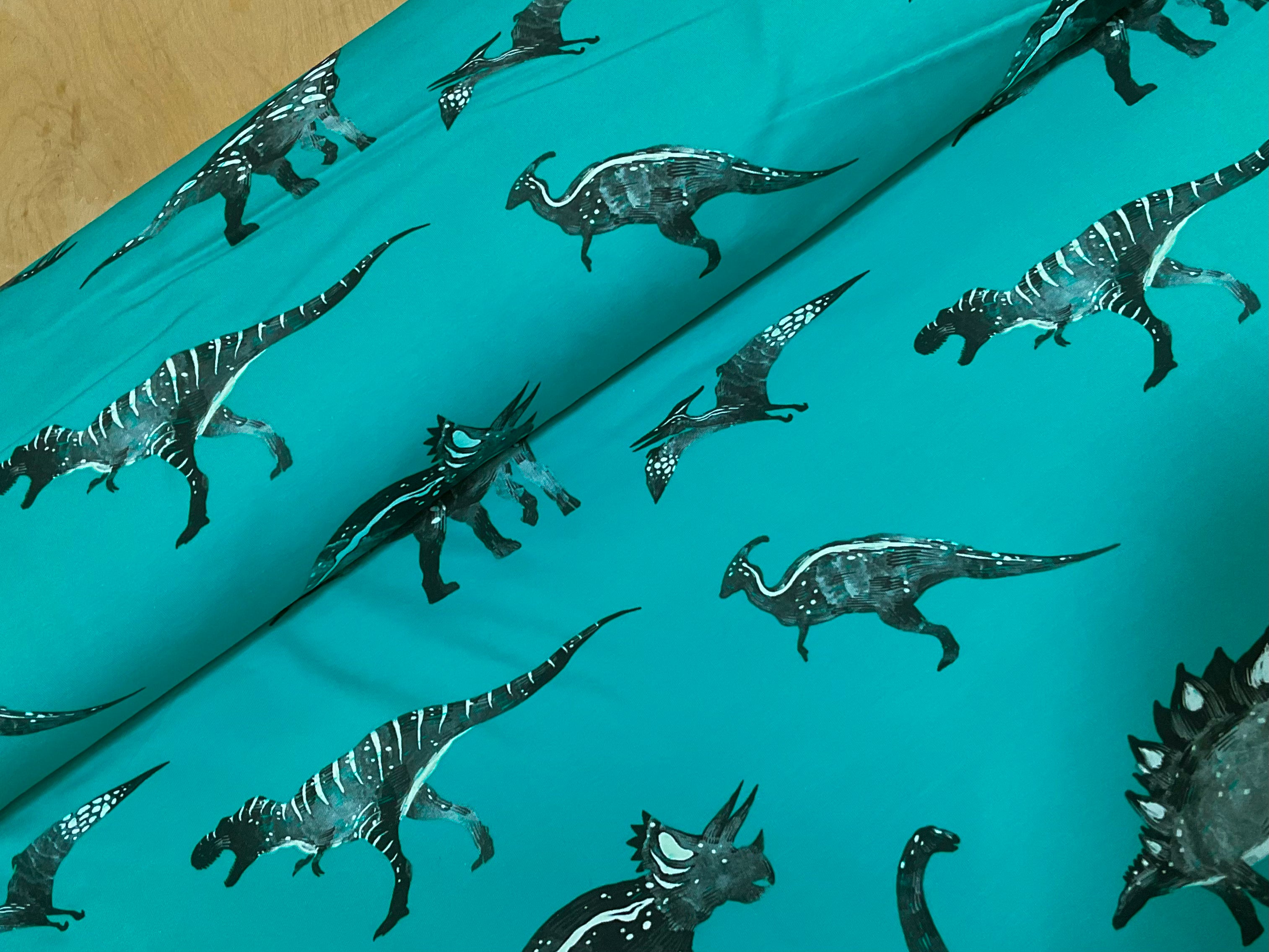 Dinosaurs on Teal Cotton Jersey Fabric