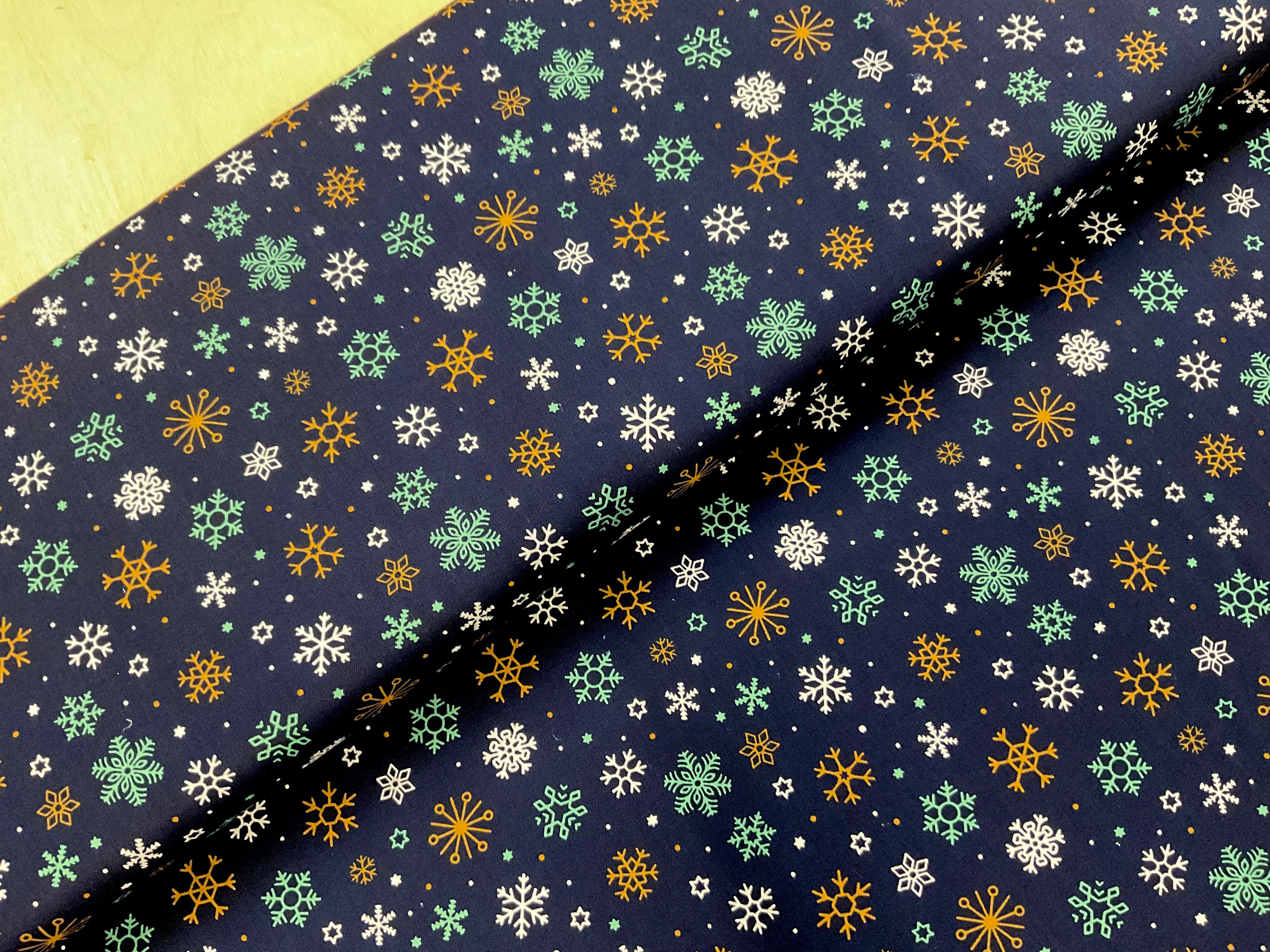 Snowflakes on Navy 100% Cotton