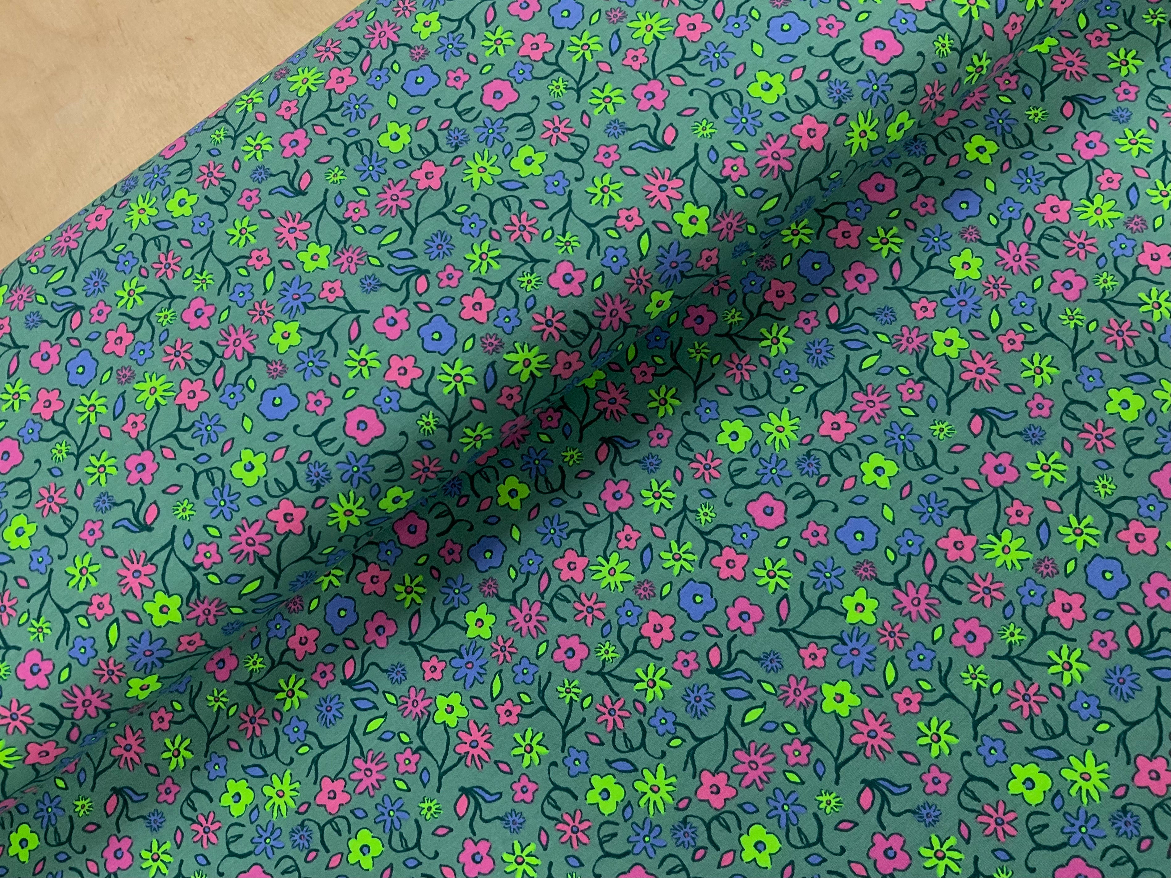 Neon Flowers on Dusty Mint Cotton Jersey Fabric