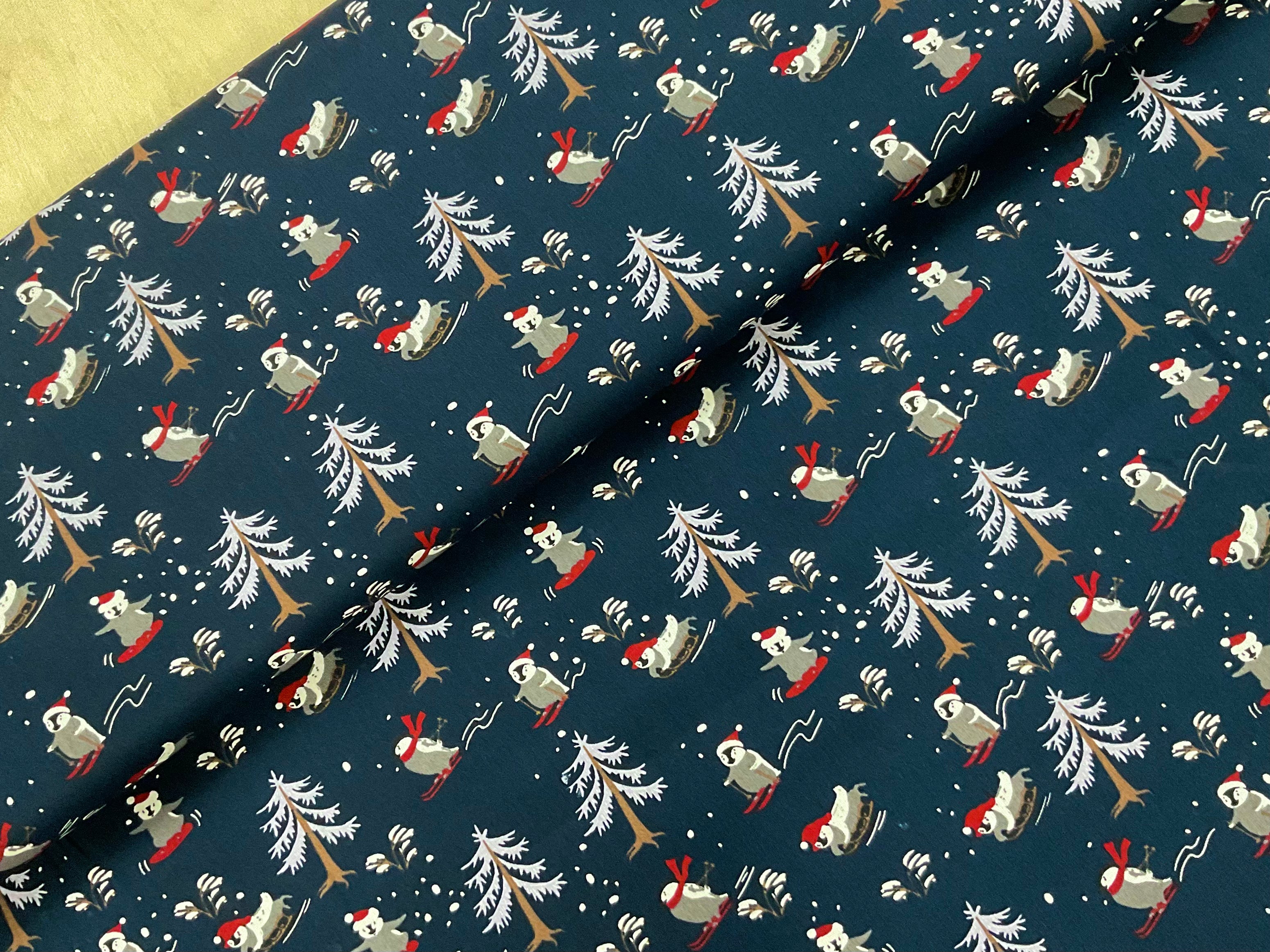 Skiing Penguins on Navy 100% Cotton