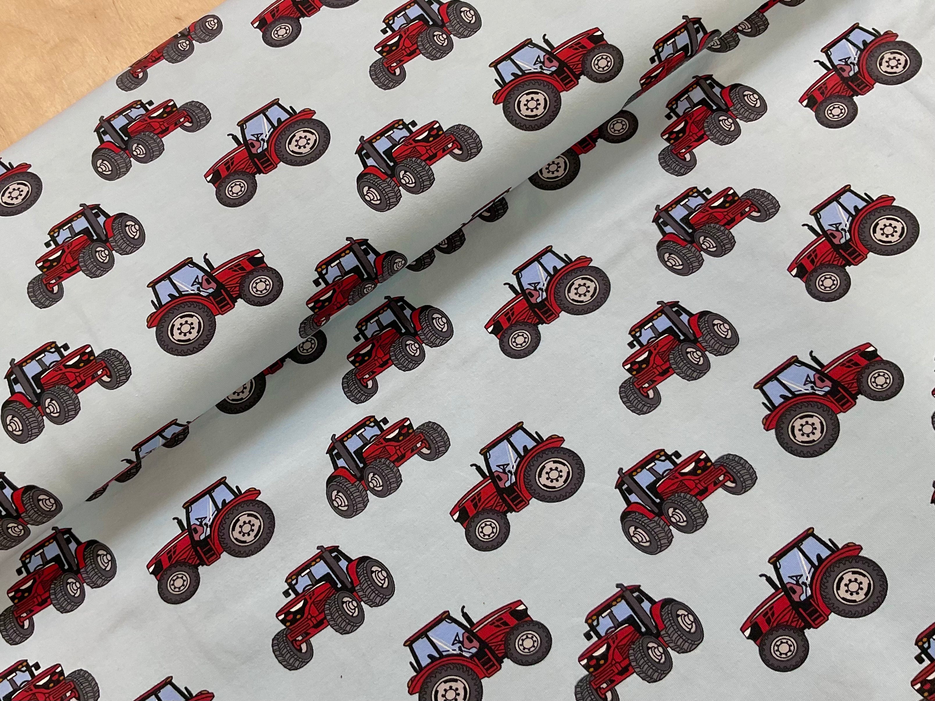 Red Tractors on Pale Blue Cotton Jersey