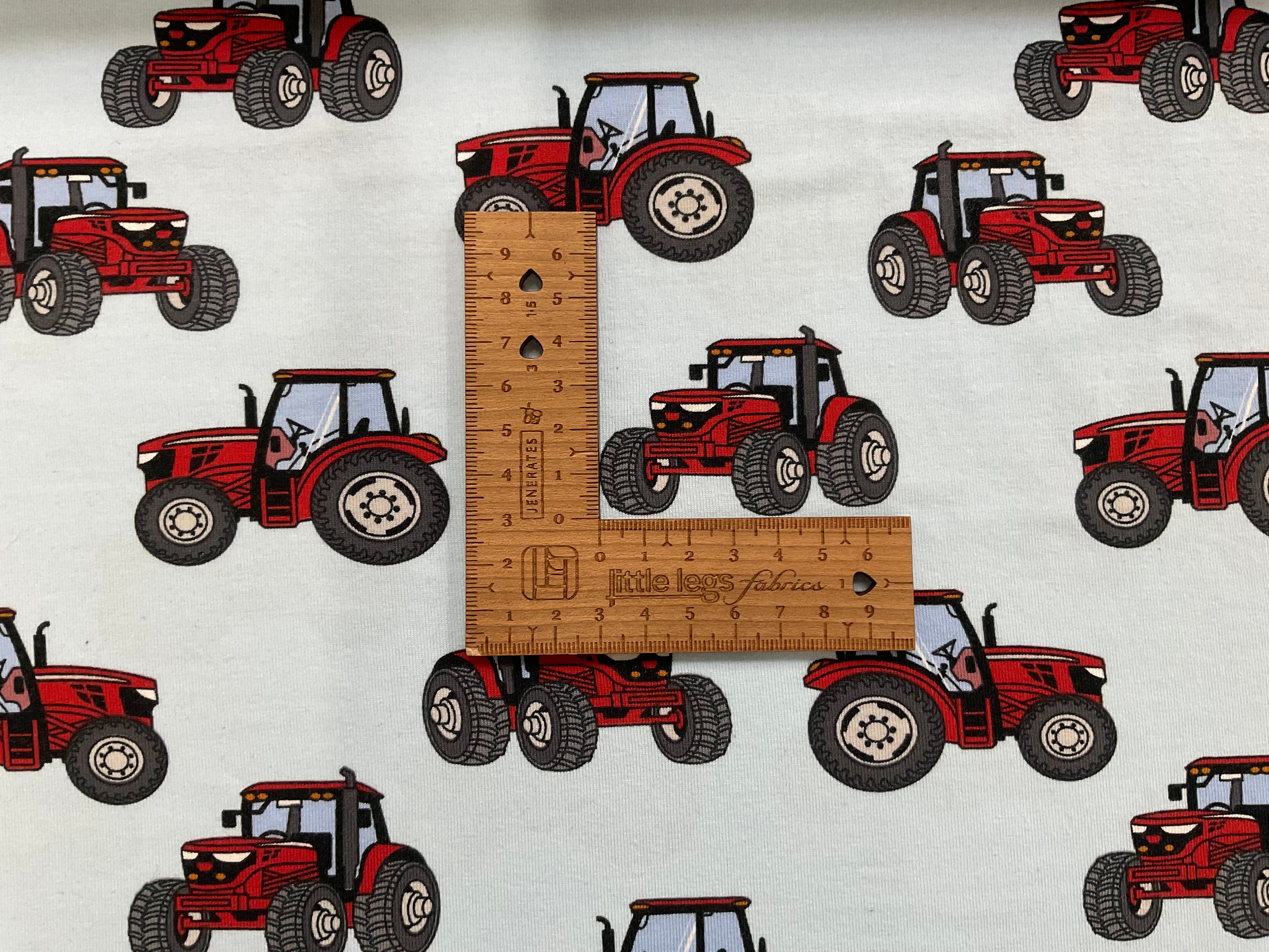 Red Tractors on Pale Blue Cotton Jersey