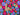 Colour burst Flowers on green Cotton Poplin