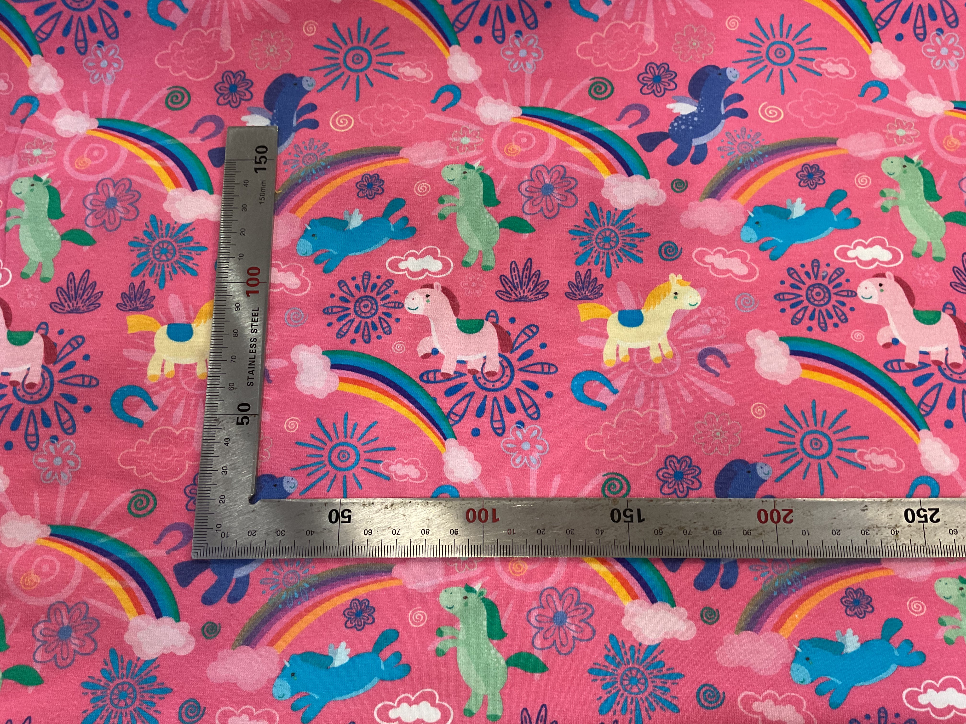 Playful Ponies and Rainbows Cotton Jersey