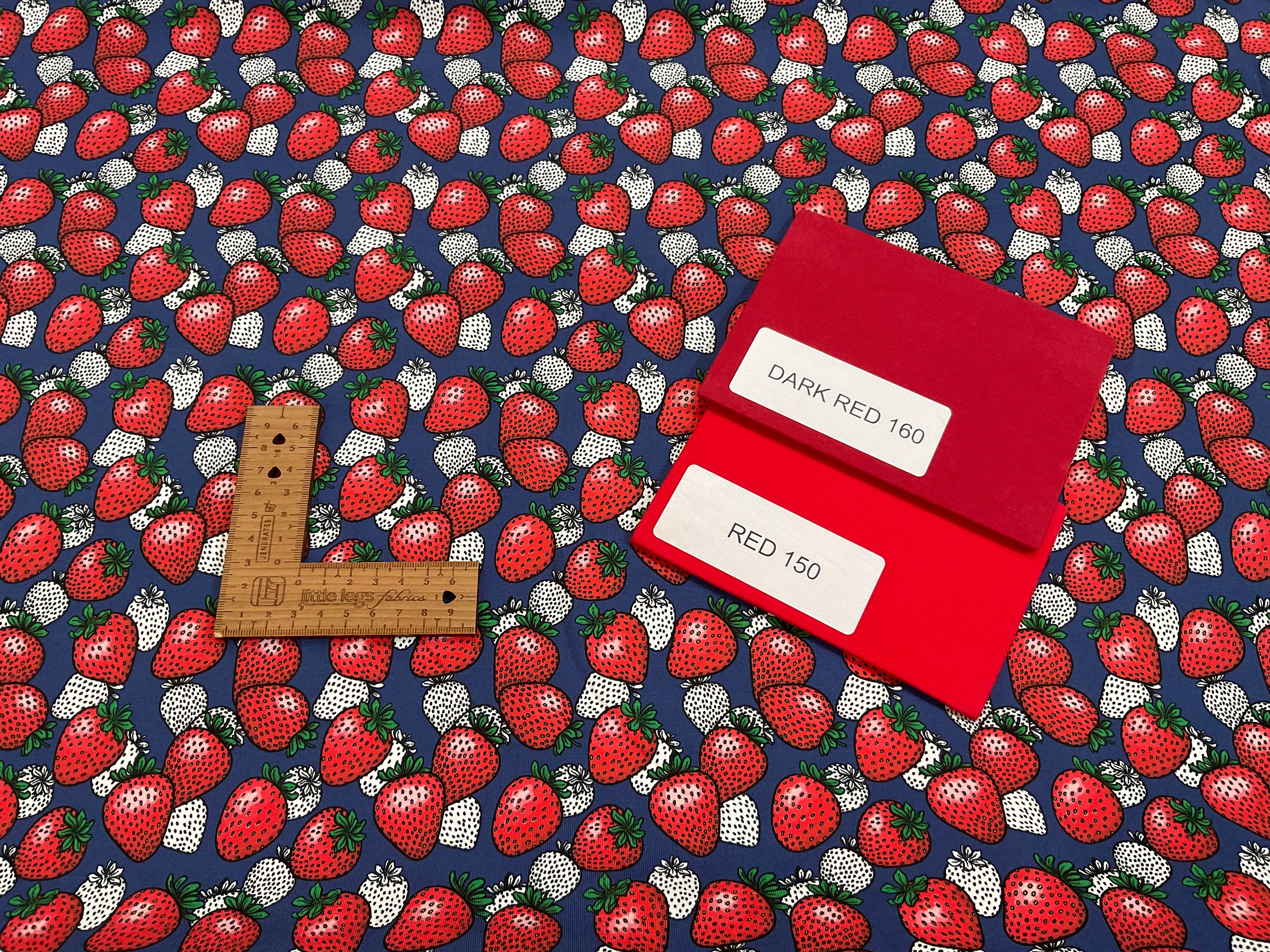 Strawberries on navy Cotton Jersey Fabric