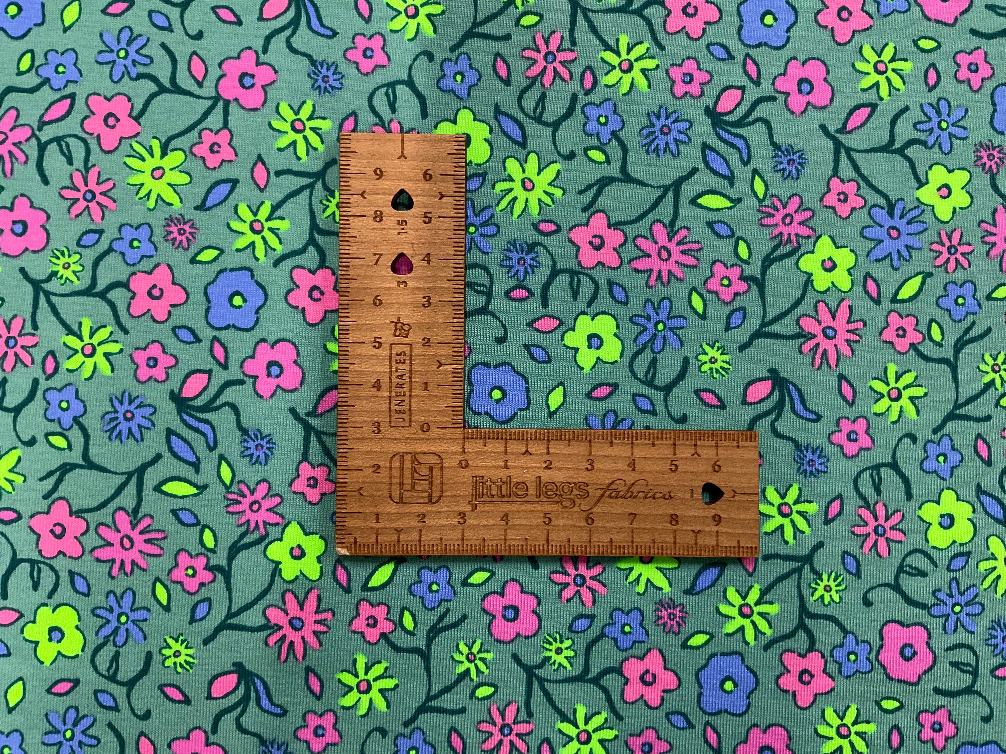 Neon Flowers on Dusty Mint Cotton Jersey Fabric