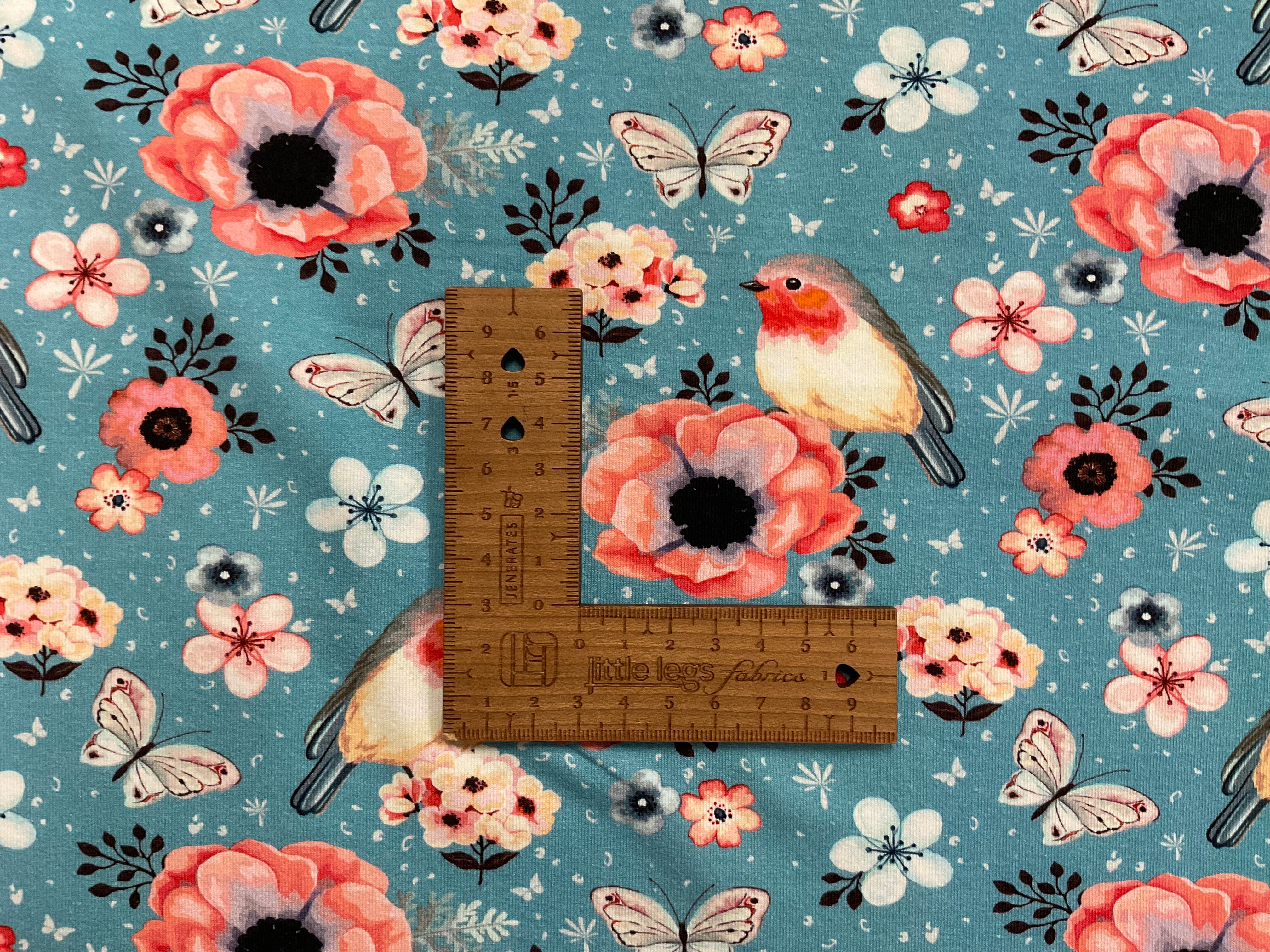 Floral Robbins on Sky Cotton Jersey Fabric