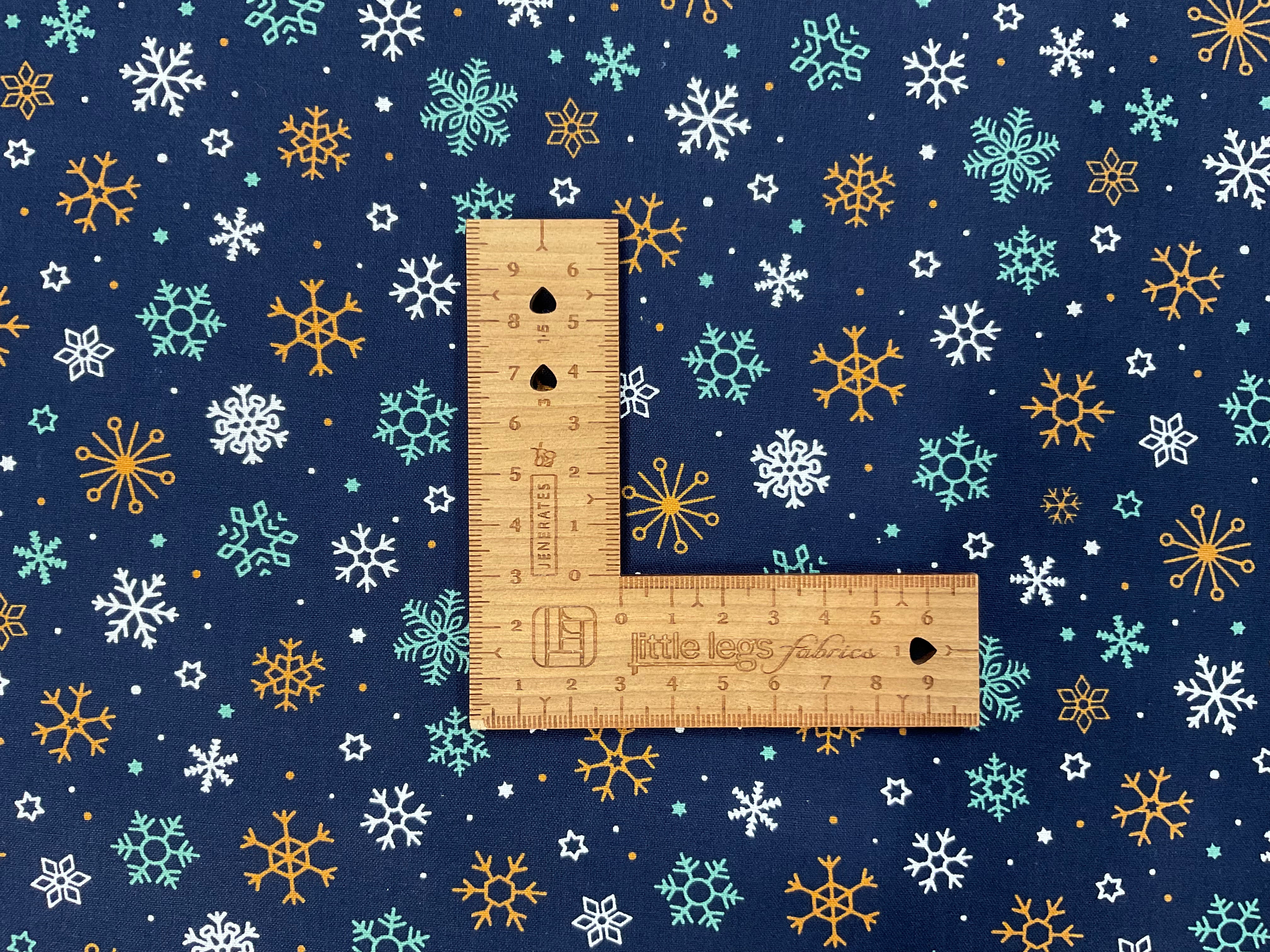 Snowflakes on Navy 100% Cotton