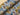 Tropical Leaves and Flowers on Dusty Blue Viscose Jersey
